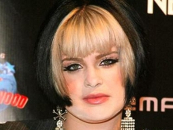 Келли Осборн сведет все татуировки