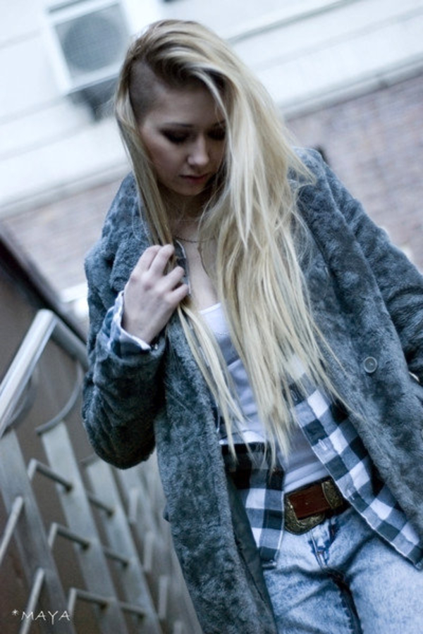 Лера Козлова остриглась налысо