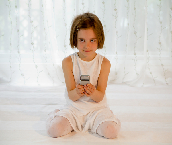 Ребенок и мобильный телефон: плюсы и минусы