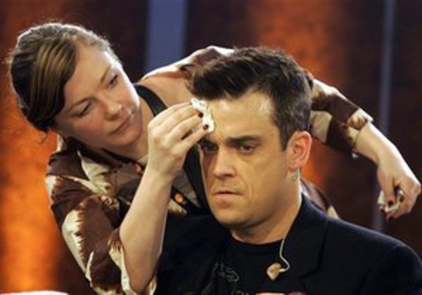 Робби Уильямс пообещал переломать ноги работникам радио за песни Coldplay и Мадонны