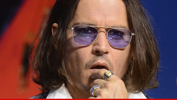 Джони Депп выплатил компенсацию женщине за публичное унижение