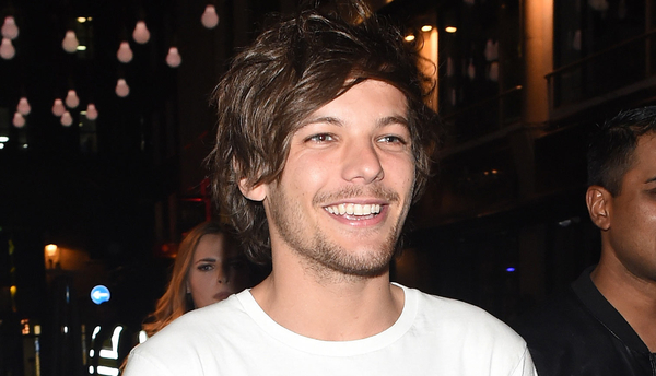 Солист One Direction впервые показал новорожденного сына