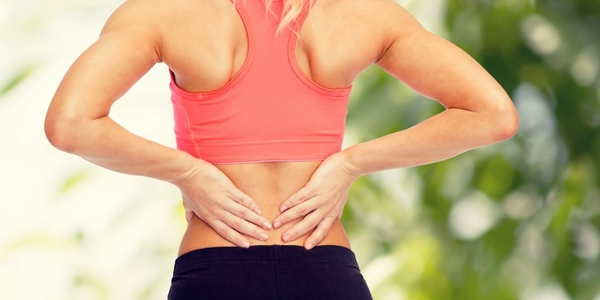Почему возникает боль в пояснице