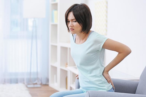 Почему возникает боль в пояснице