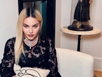 Мадонна поскандалила с 50 Cent из-за откровенной фотосессии